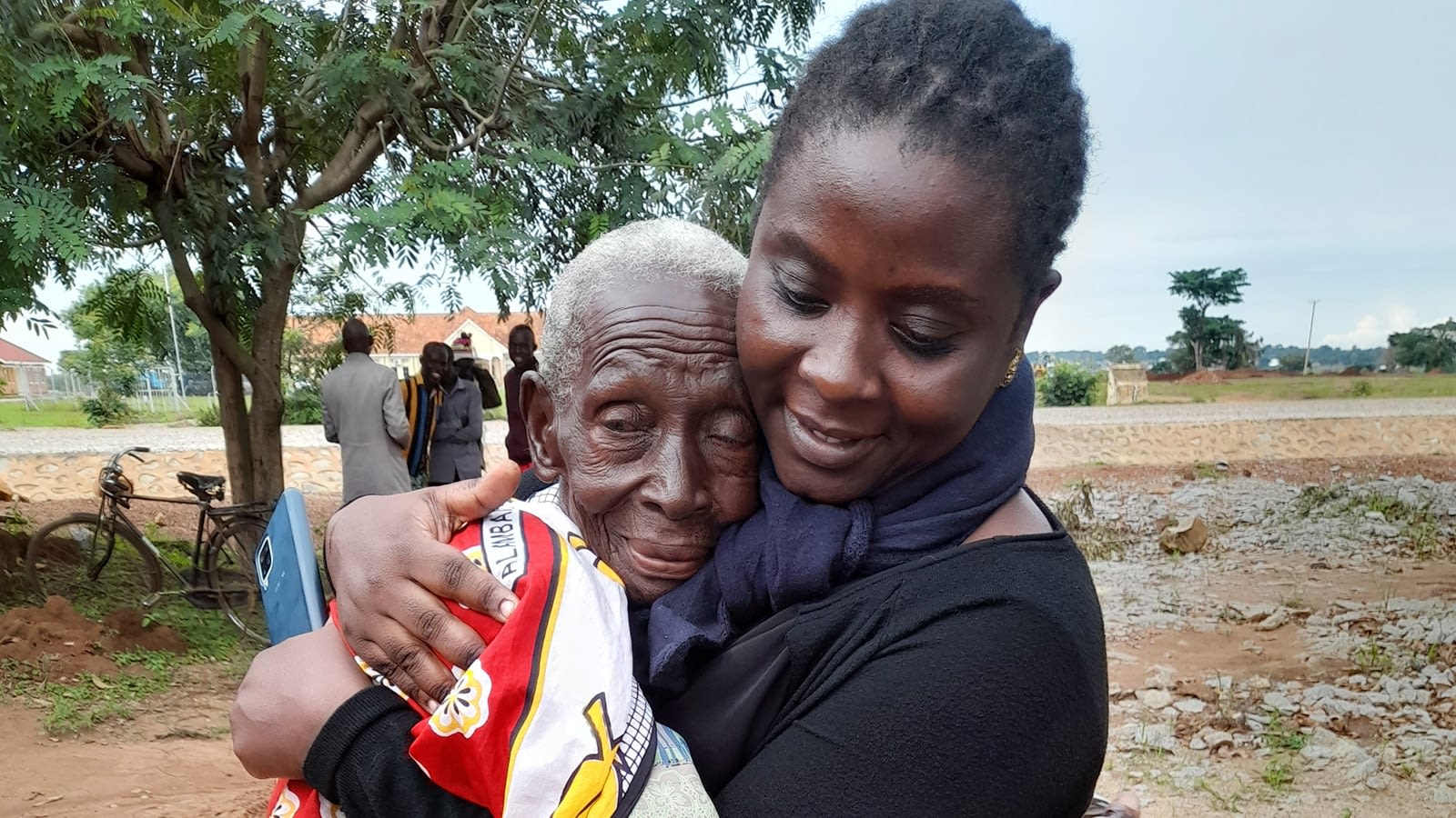 Social worker hugging a widow