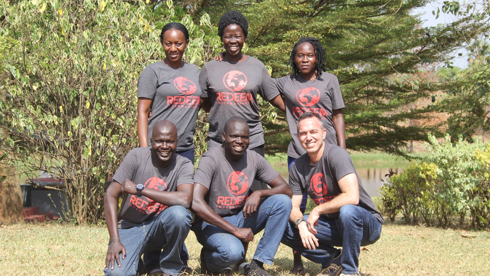 Six Redeem International team members pose for a photo.