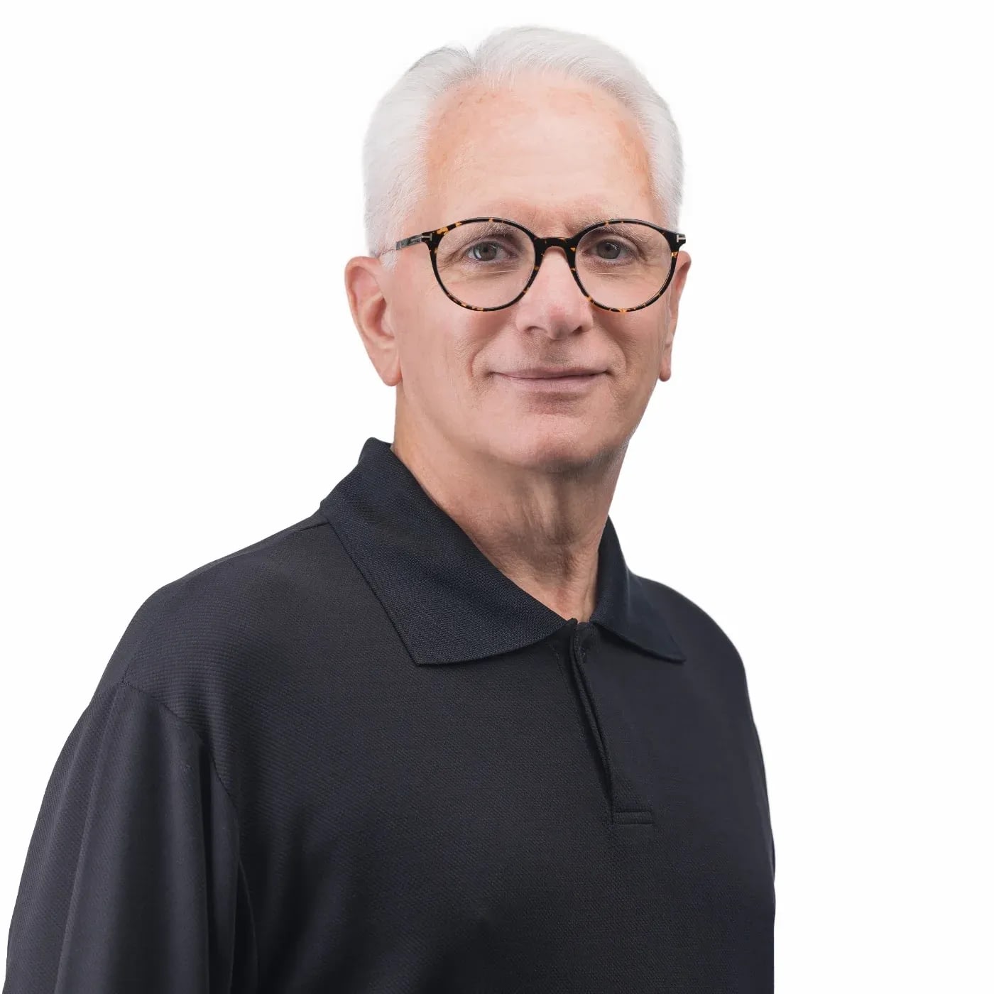 Older man with glasses in black polo shirt