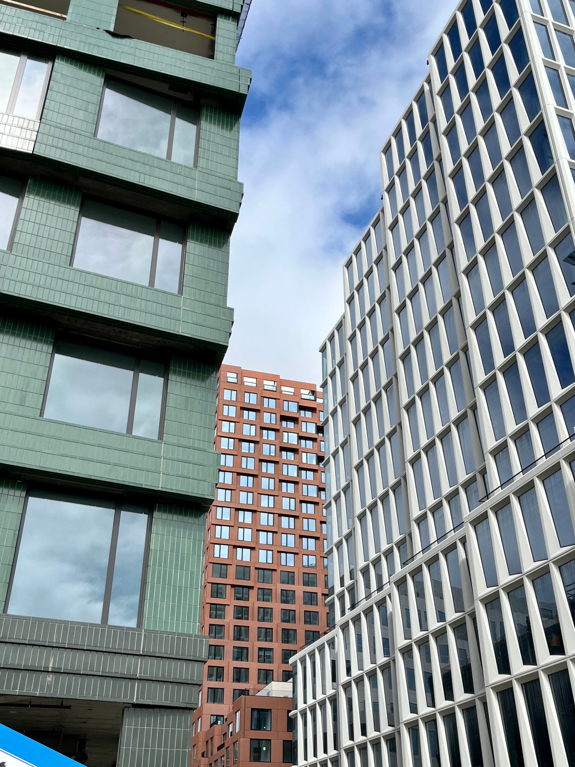 Modern high-rise buildings against blue sky