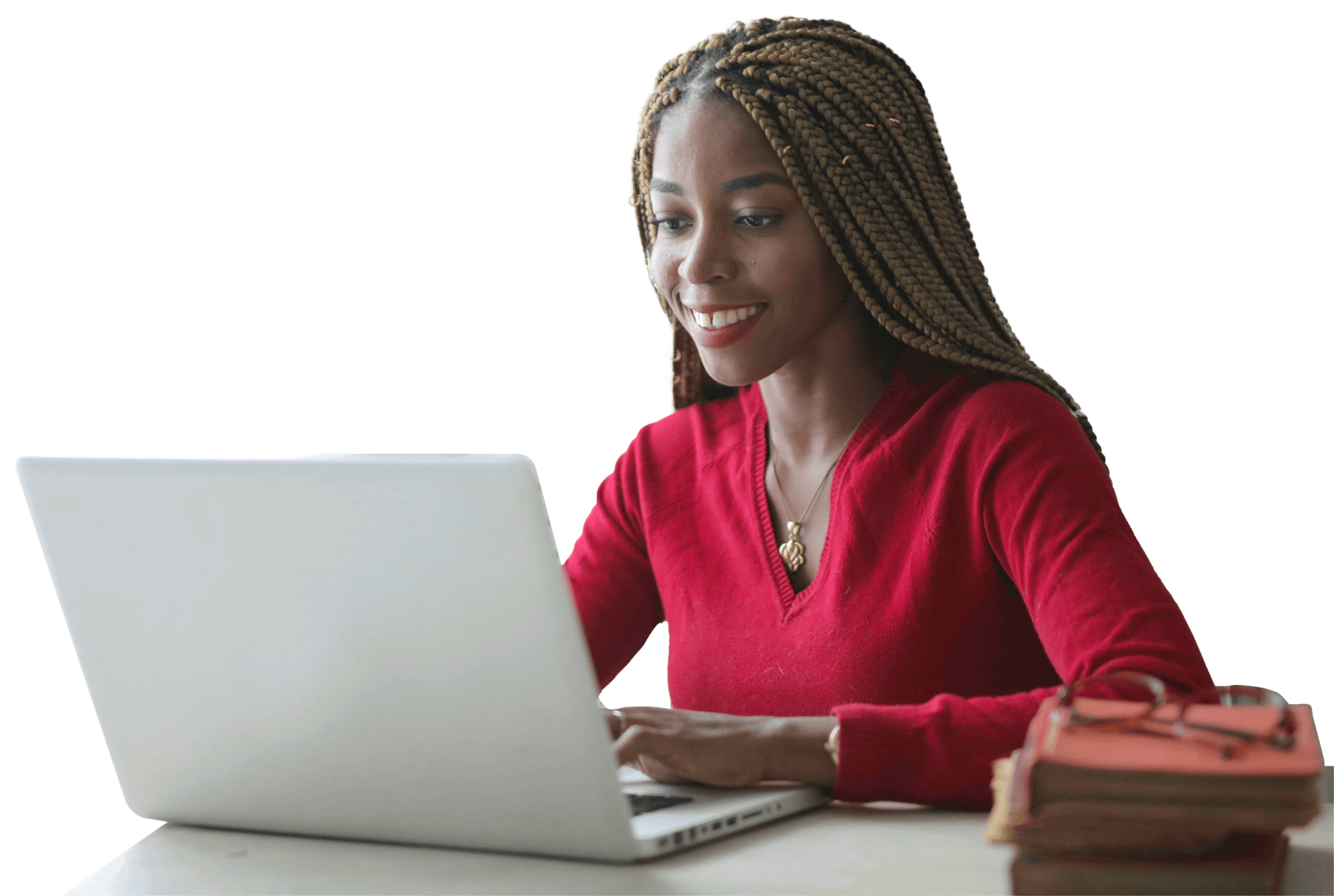 Woman working on laptop at desk