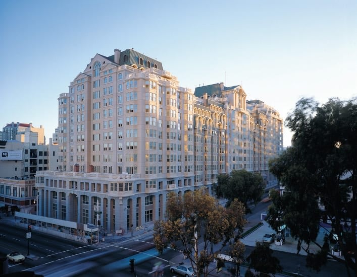 Large urban building with sunset lighting